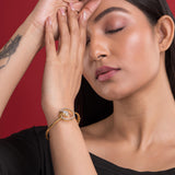 Delicate silver hand bracelet featuring a floral design, blending femininity with elegance
