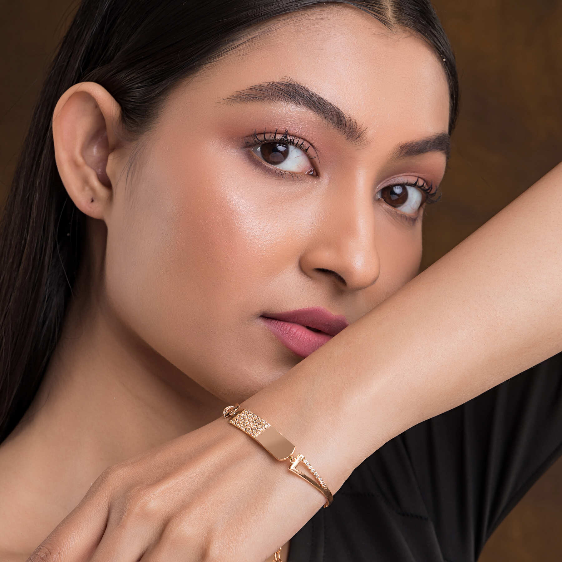 Delicate sterling silver charm bracelet featuring unique pendants, adding a personal touch to any outfit