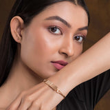 Delicate sterling silver charm bracelet featuring unique pendants, adding a personal touch to any outfit