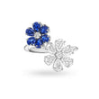 925 Flower-shaped jewelry piece with blue gemstones and clear stones on a white background
