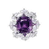 Purple gemstone surrounded by clear gemstones on a white background