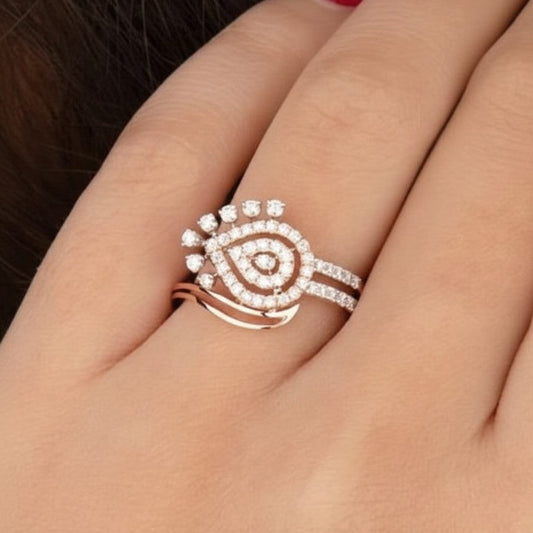Rose gold ring with diamonds on a hand