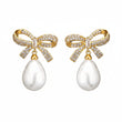 Élan Bow Pearl Silver Earrings for Women