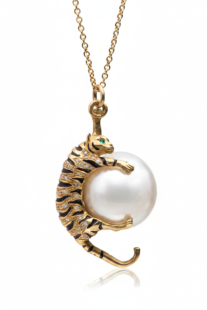 Gold tiger pendant with a pearl silver necklace